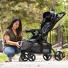 imageBaby Trend Passport Carriage Stroller Travel System with EZLift Infant Car Seat Dash PinkJourney Black